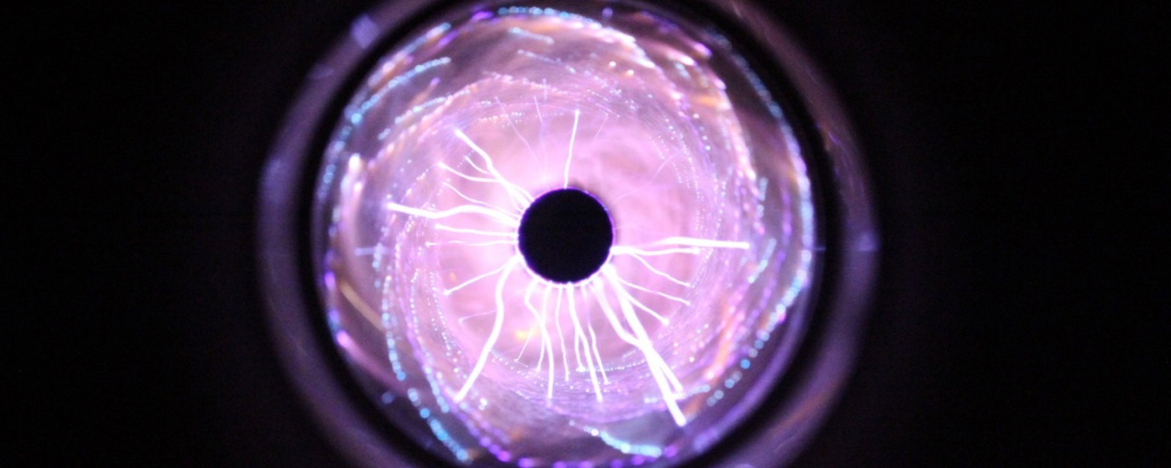 Abstract purple plasma orb representing innovation and science
