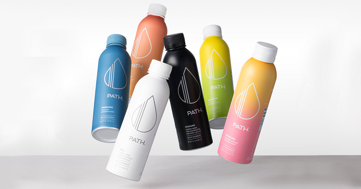 A colorful range of PATH refillable water bottles arranged together